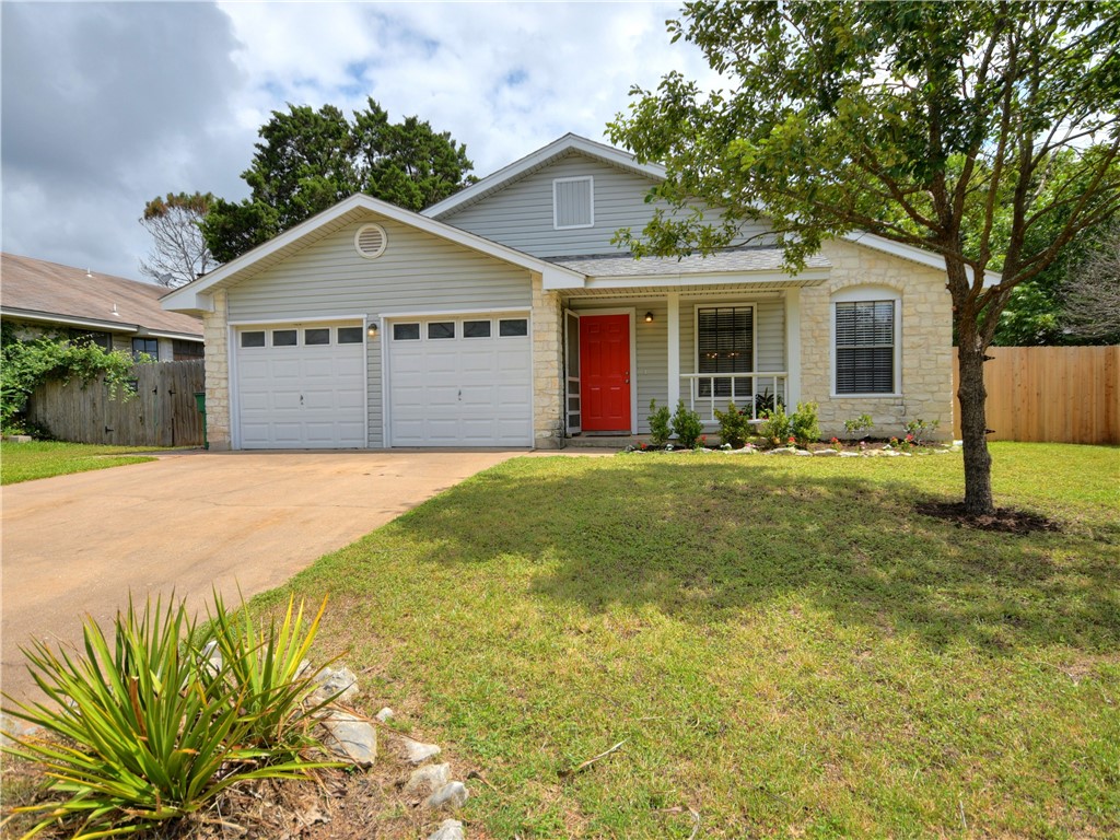 4000 Gemstone Road Austin, TX 78749 - Photo 1 of 1 a front view of house with yard and green space