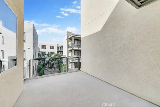 a view of a terrace with wooden fence