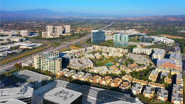 an aerial view of a city with lots of residential buildings