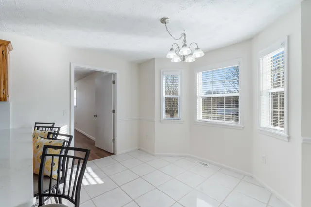 a view of a livingroom with a workspace