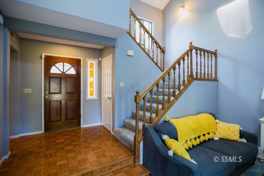 415 Tepatitlan Court Ridgecrest, CA 93555 - Photo 5 of 33 a view of entryway and hall with wooden floor