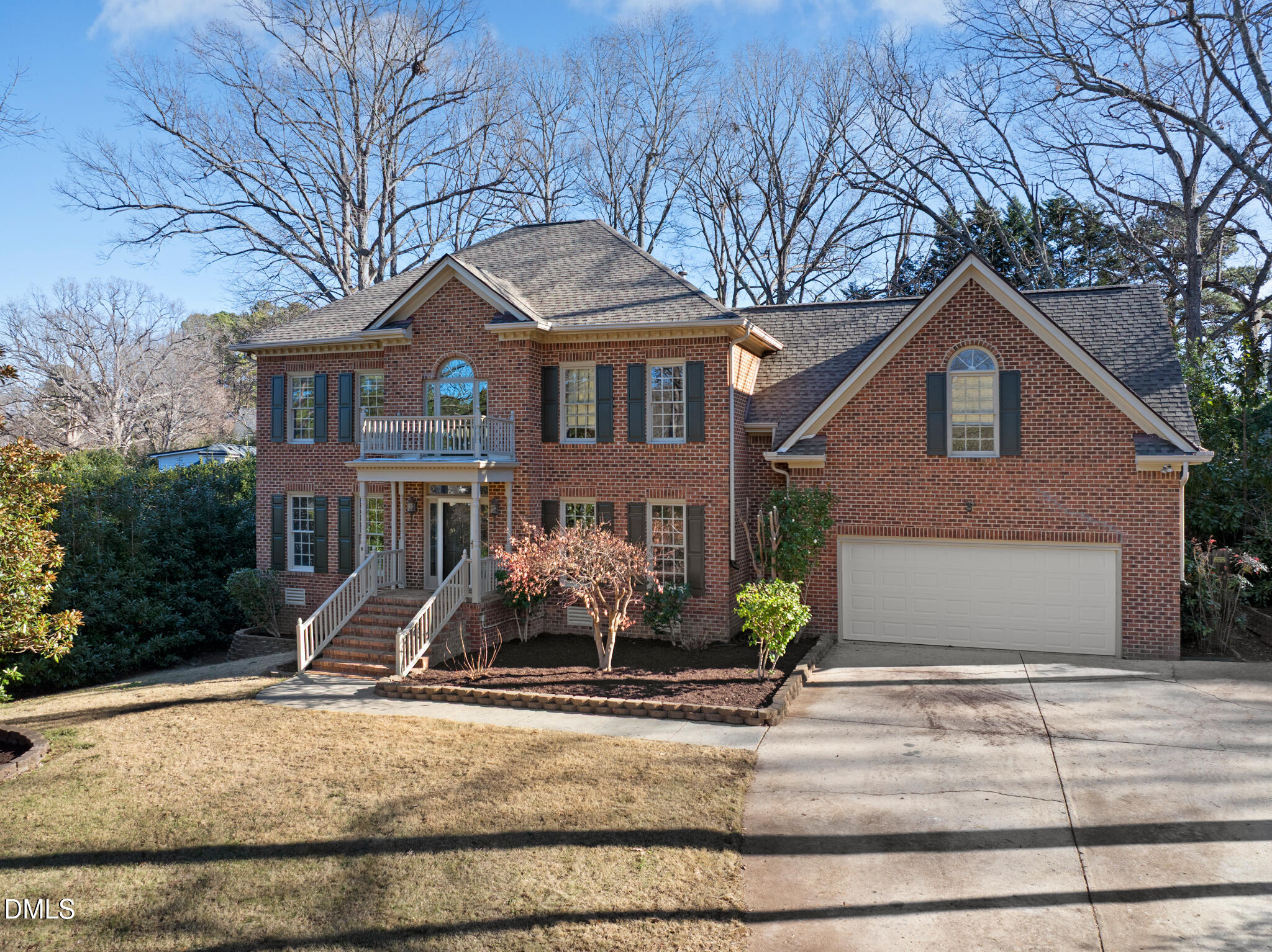 3812 City Of Oaks Wynd Raleigh, NC 27612 - Photo 1 of 79 a front view of a house with garden