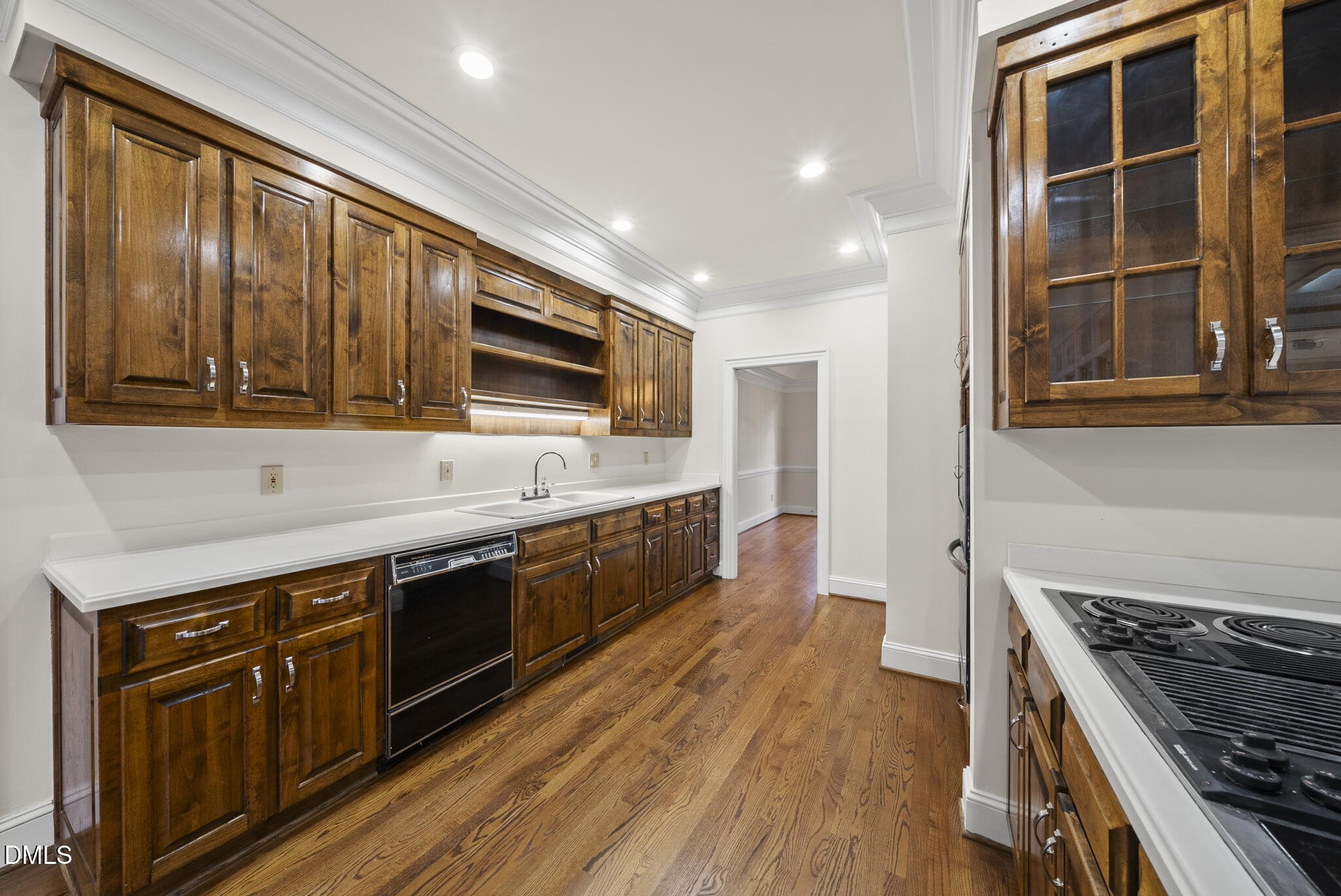 3812 City Of Oaks Wynd Raleigh, NC 27612 - Photo 29 of 79 a kitchen with stainless steel appliances granite countertop wooden cabinets and a stove top oven