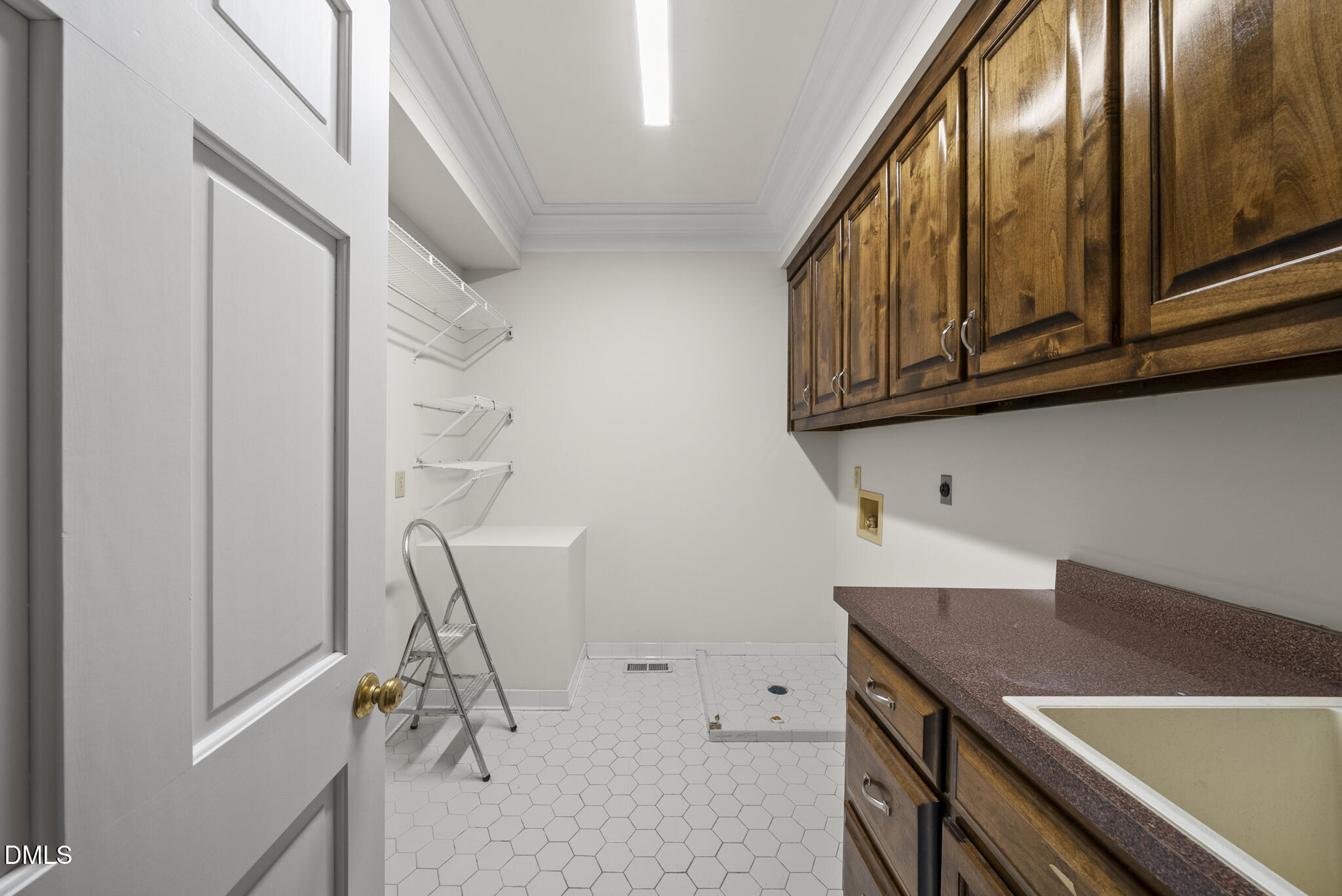 3812 City Of Oaks Wynd Raleigh, NC 27612 - Photo 39 of 79 a view of a storage and utility room with stair