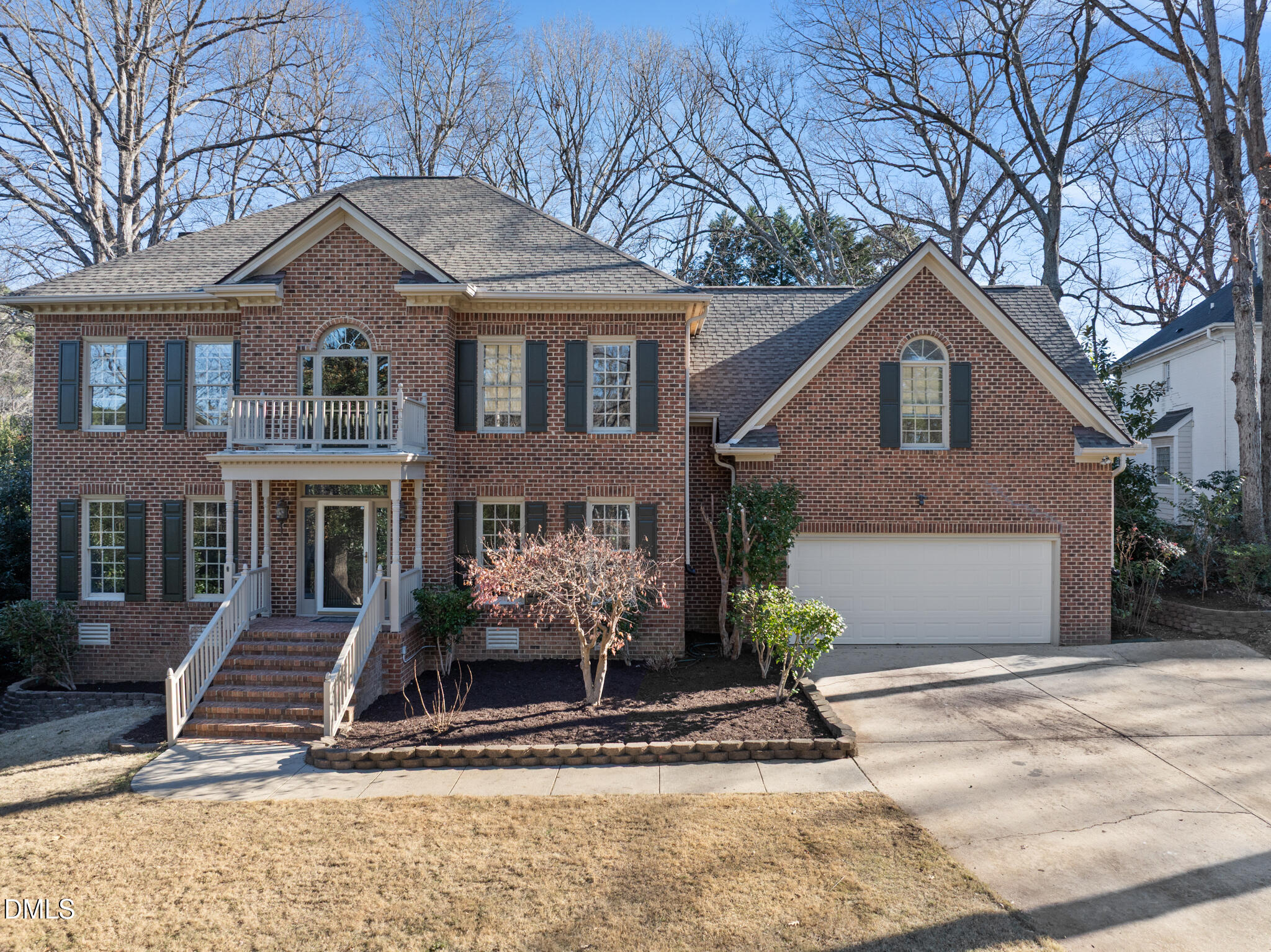 3812 City Of Oaks Wynd Raleigh, NC 27612 - Photo 3 of 79 a front view of a house with garden and plants