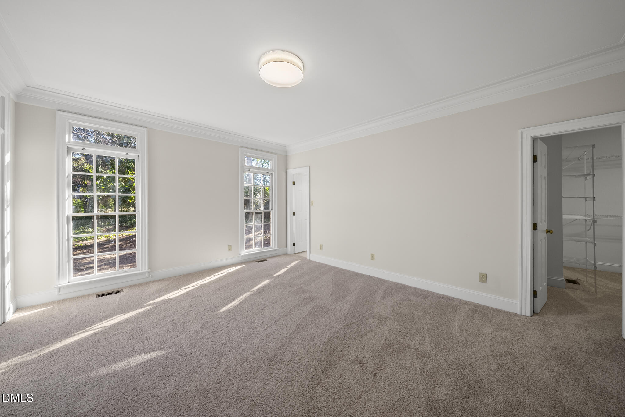 3812 City Of Oaks Wynd Raleigh, NC 27612 - Photo 41 of 79 an empty room with windows