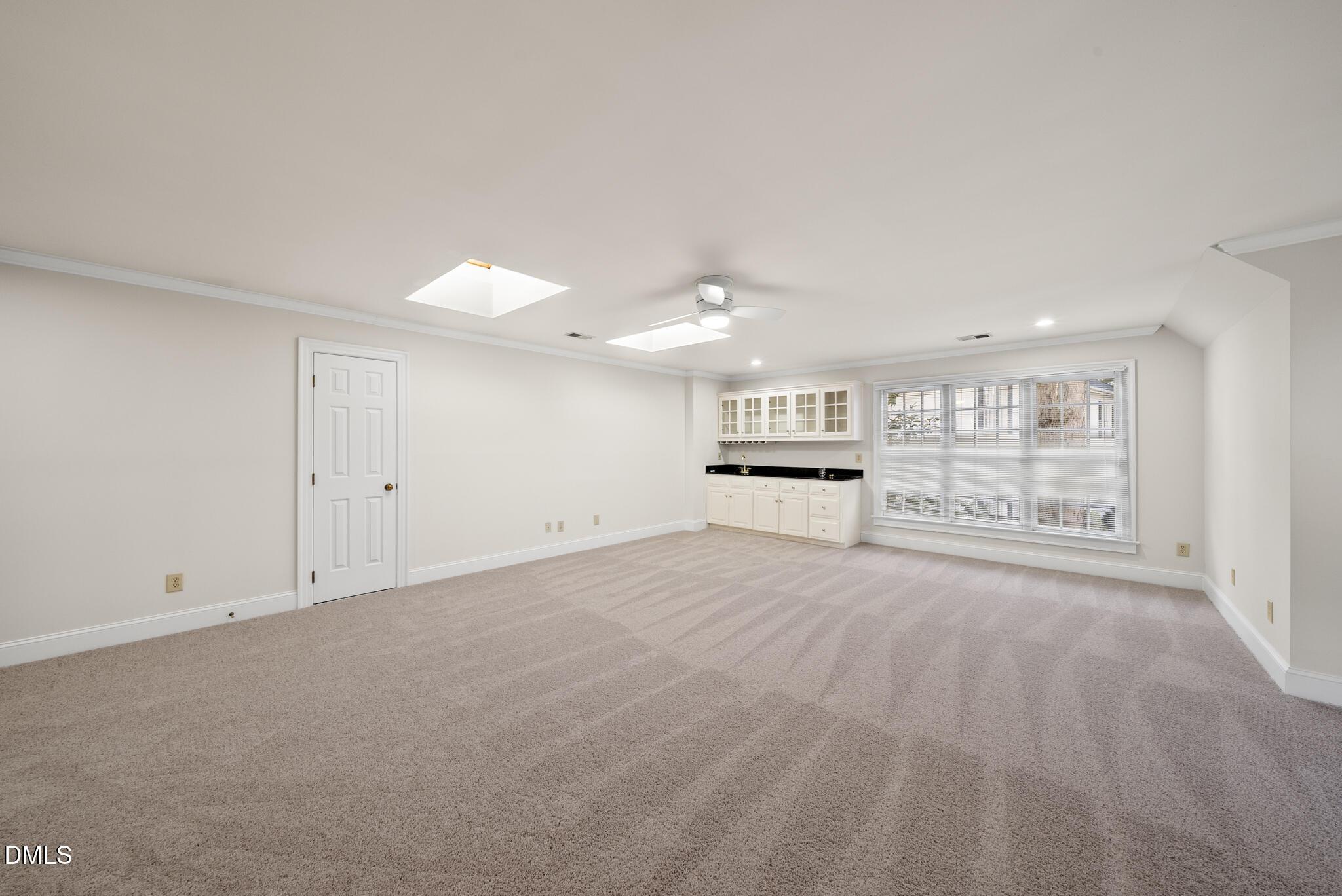 3812 City Of Oaks Wynd Raleigh, NC 27612 - Photo 44 of 79 a view of an empty room with a kitchen