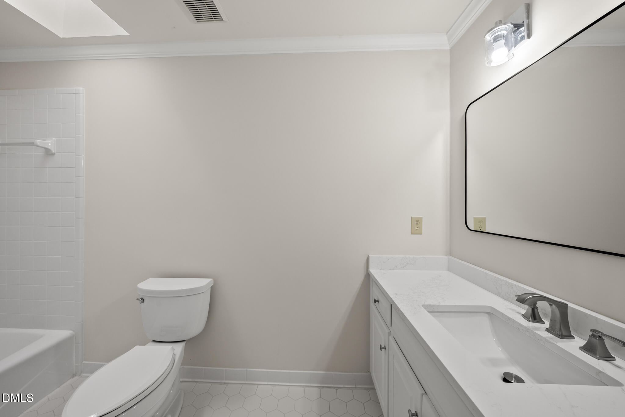 3812 City Of Oaks Wynd Raleigh, NC 27612 - Photo 53 of 79 a bathroom with a sink toilet and vanity