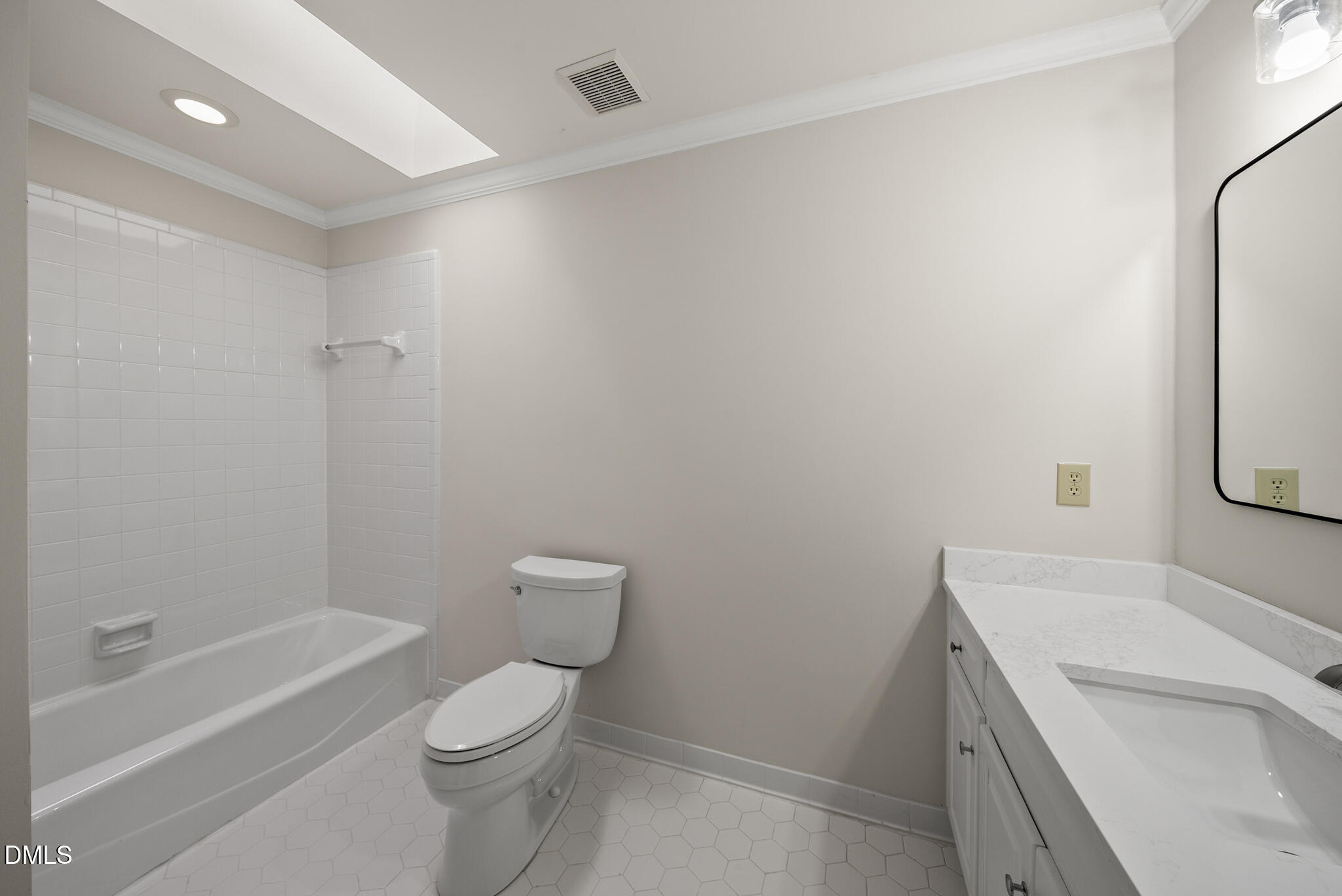 3812 City Of Oaks Wynd Raleigh, NC 27612 - Photo 54 of 79 a bathroom with a sink a toilet and shower