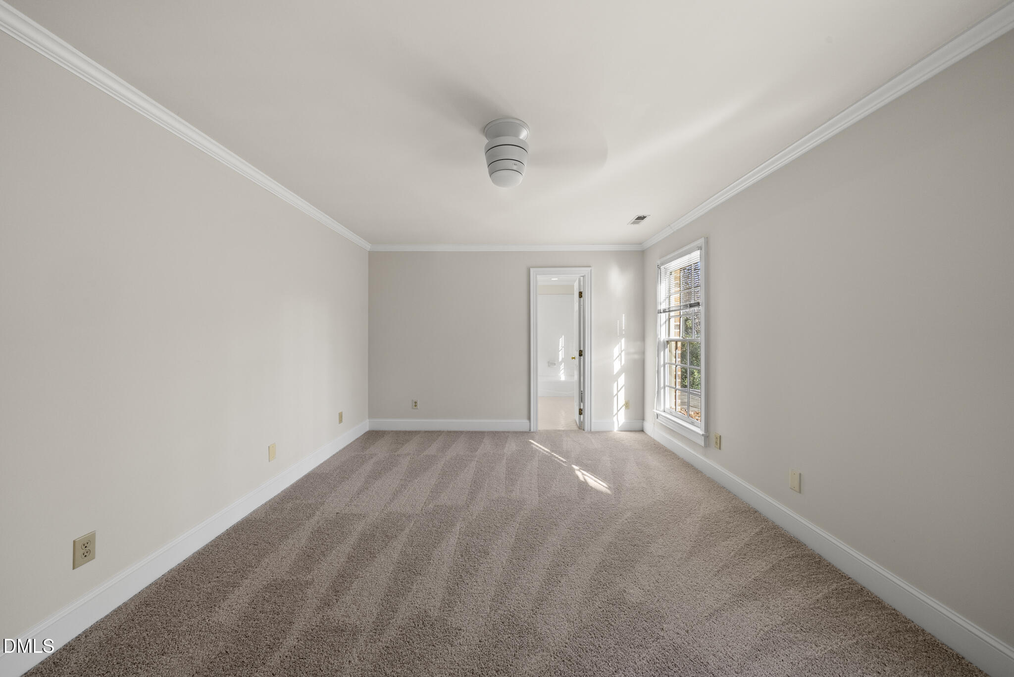 3812 City Of Oaks Wynd Raleigh, NC 27612 - Photo 58 of 79 a view of an empty room with a window