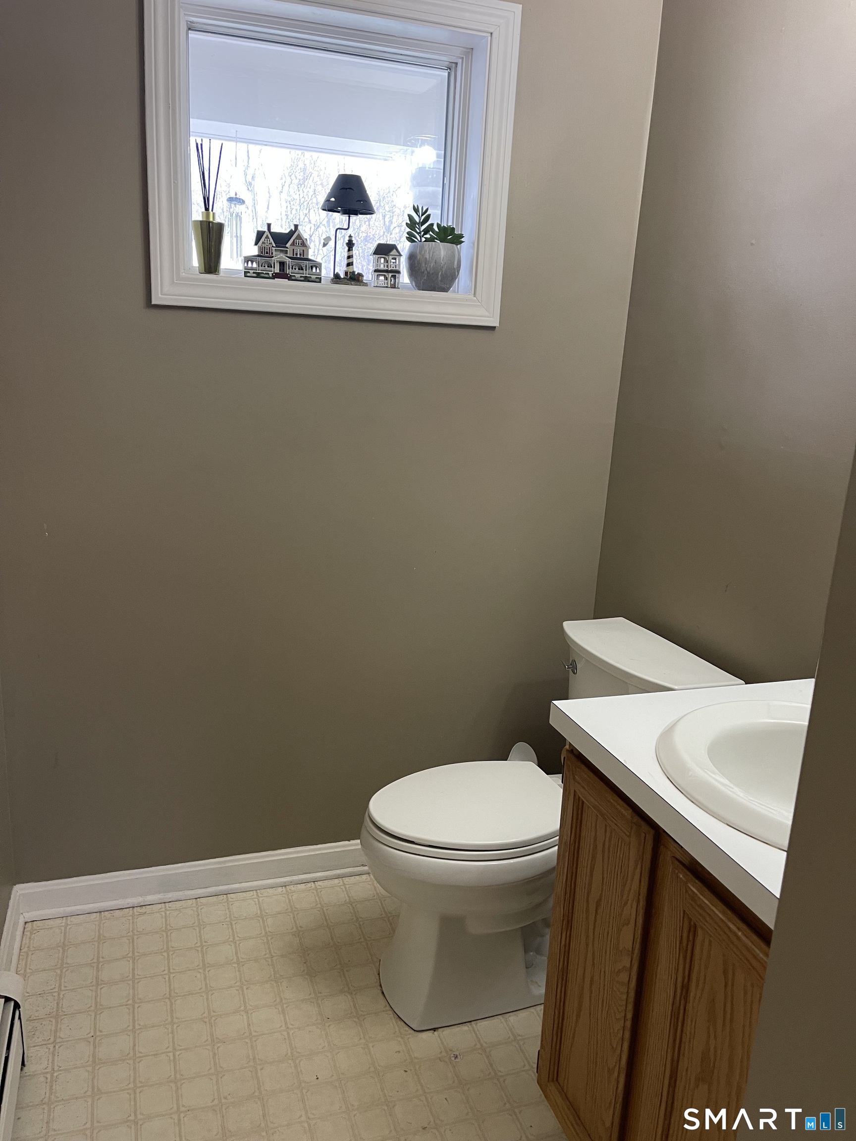163 Trotters Way Torrington, CT 06790 - Photo 15 of 23 a white toilet sitting next to a white sink