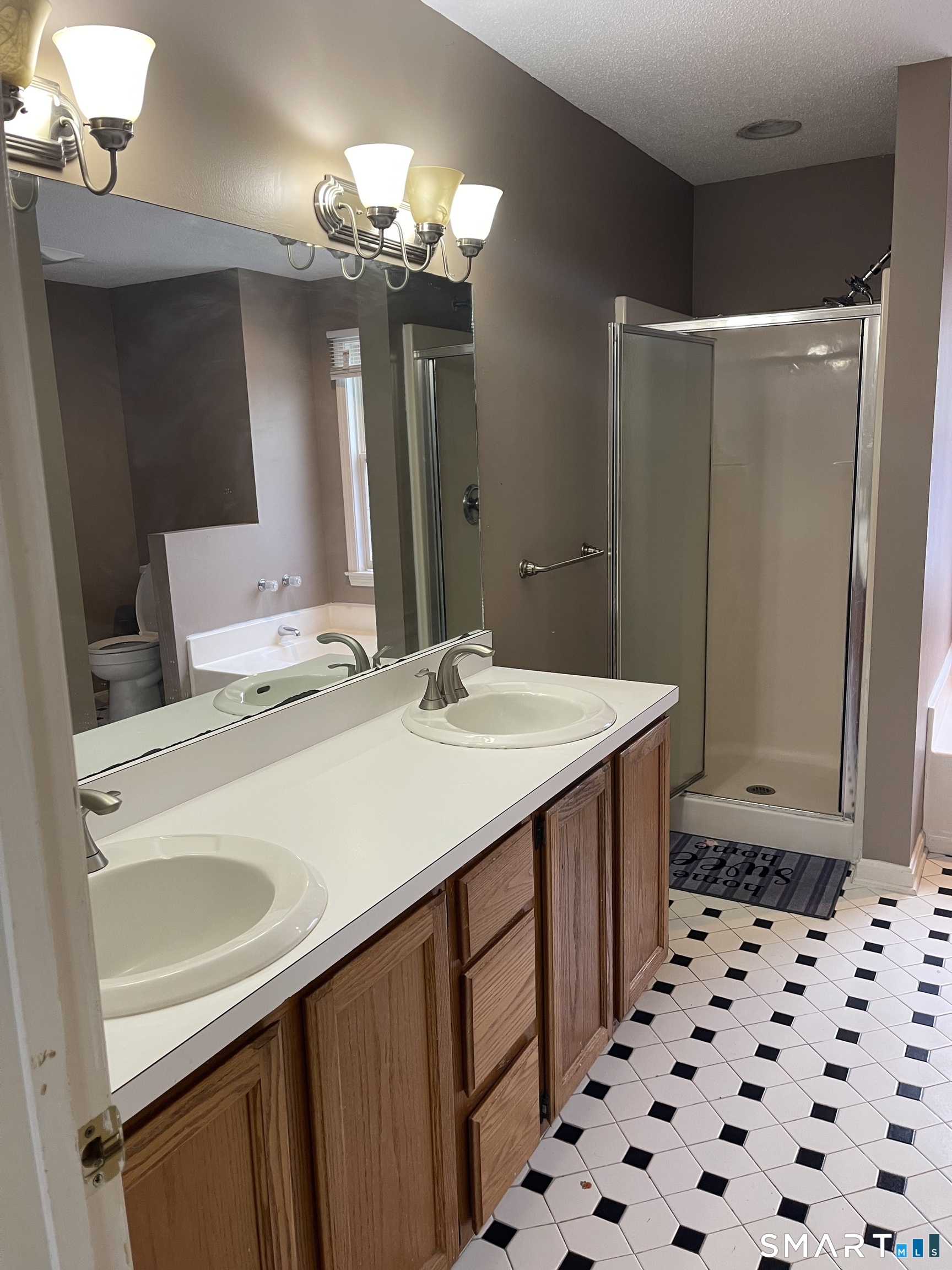 163 Trotters Way Torrington, CT 06790 - Photo 8 of 23 a bathroom with a sink a vanity and a mirror