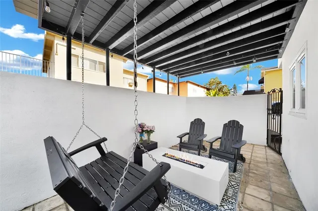 a kitchen with a sink a stove and a refrigerator