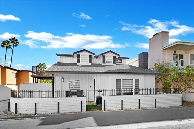 a view of a porch with chairs and backyard