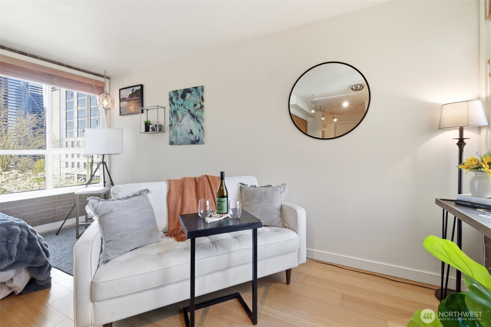 905 Cherry Street, Unit 306 Seattle, WA 98104 - Photo 9 of 25 a living room with furniture