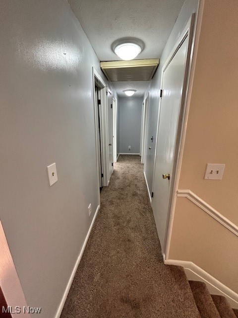 17510 Munn Road Chagrin Falls, OH 44023 - Photo 18 of 35 Corridor with carpet, visible vents, baseboards, and a textured ceiling