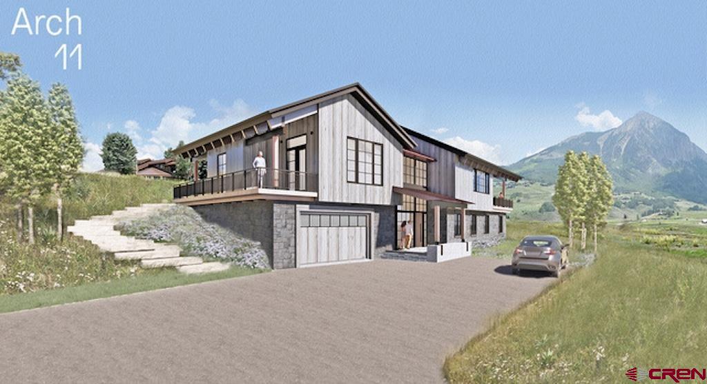 565 Saddle Ridge Ranch Road Crested Butte, CO 81224 - Photo 19 of 35 a front view of a house with a yard