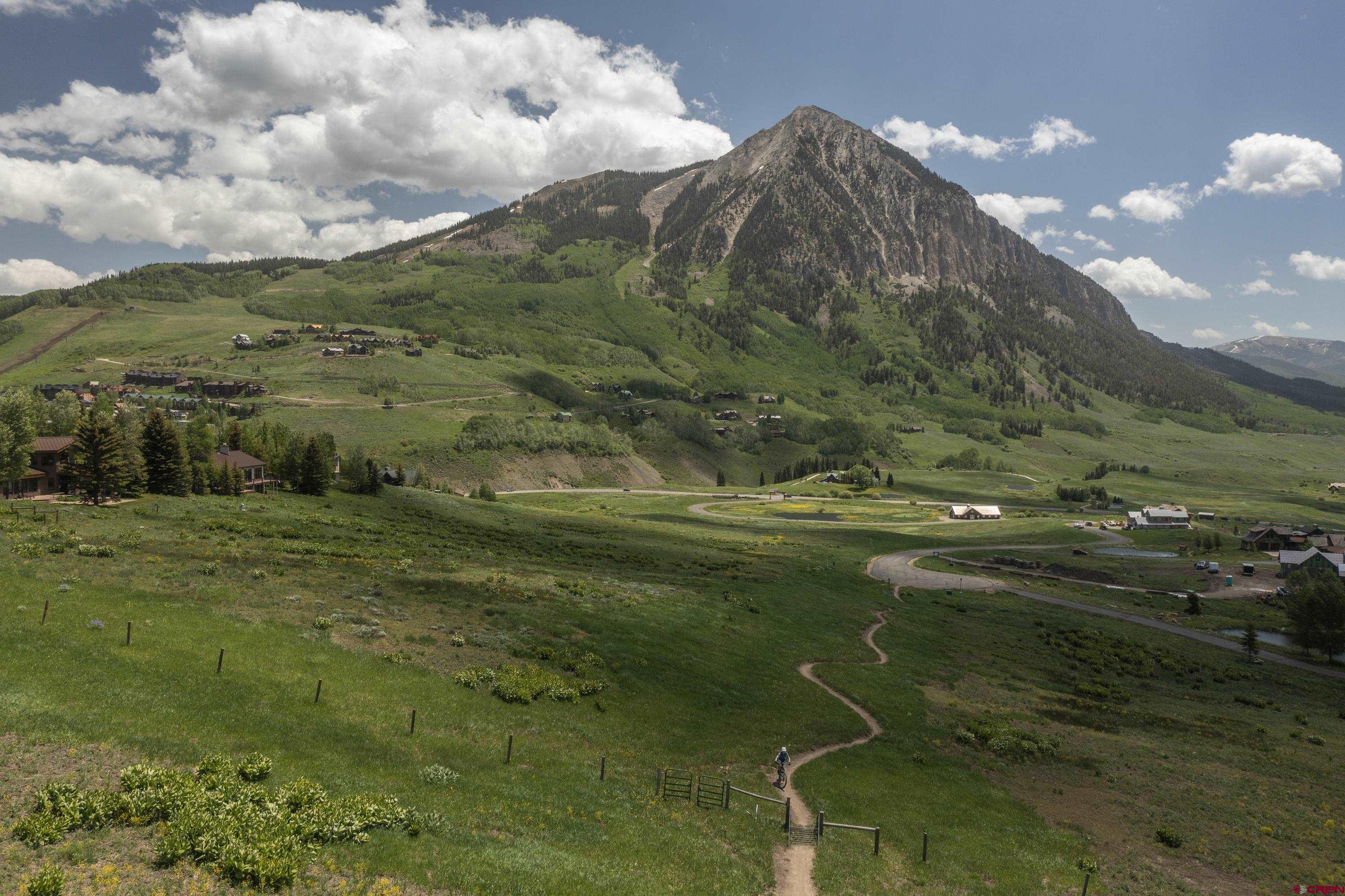 565 Saddle Ridge Ranch Road Crested Butte, CO 81224 - Photo 3 of 35 a view of a water pond with green space