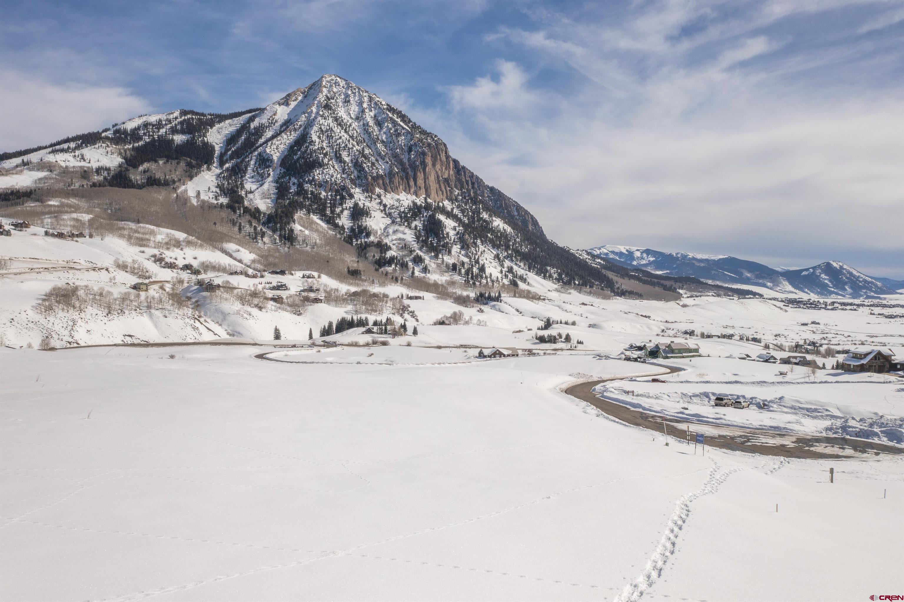565 Saddle Ridge Ranch Road Crested Butte, CO 81224 - Photo 7 of 35 a view of water covered with snow in the background