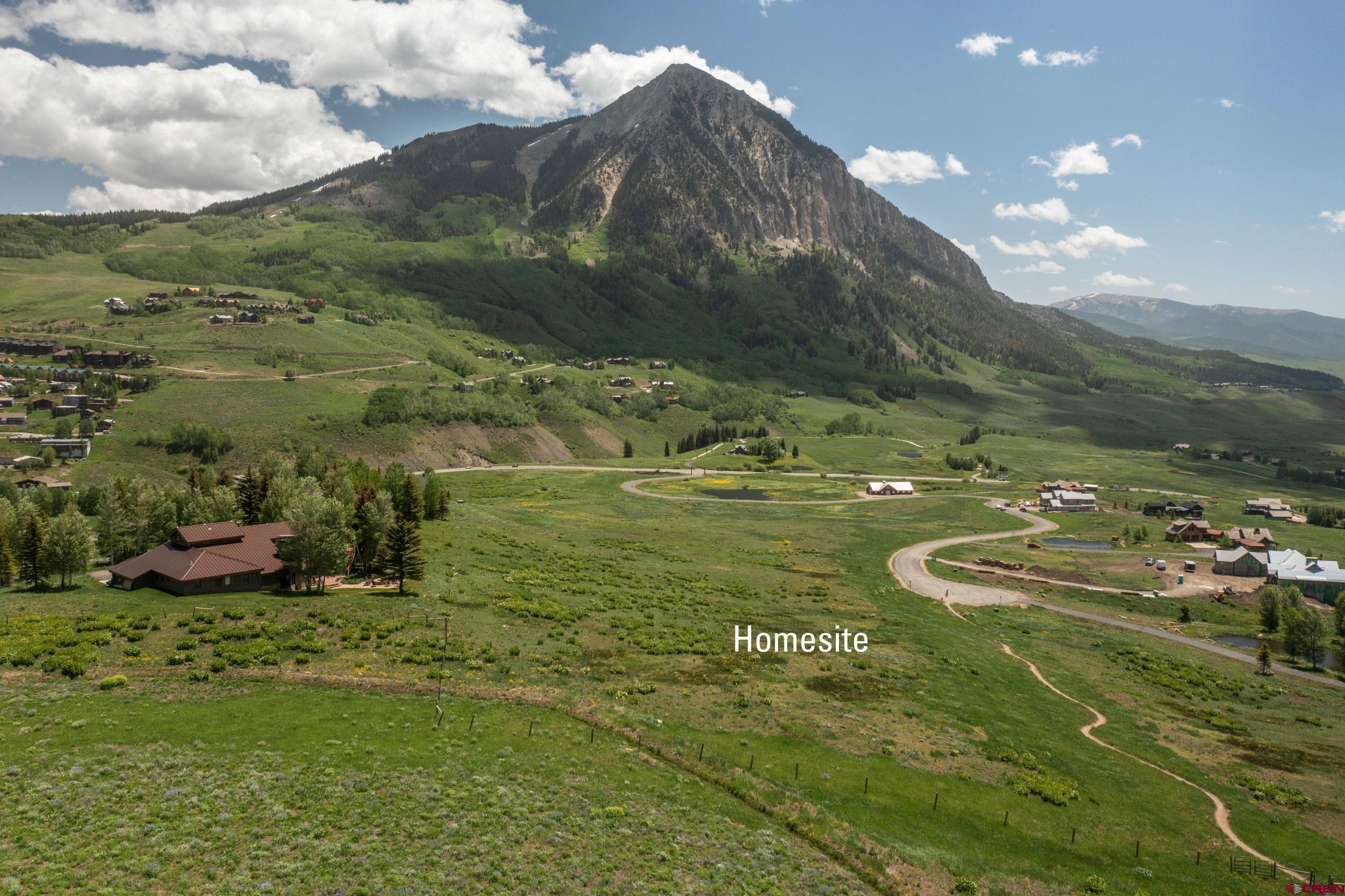 565 Saddle Ridge Ranch Road Crested Butte, CO 81224 - Photo 9 of 35 a view of a water with an outdoor space