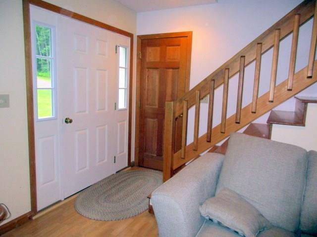 610 Belgrade Road Oakland, ME 04963 - Photo 14 of 28 Front door and stairs to the second...