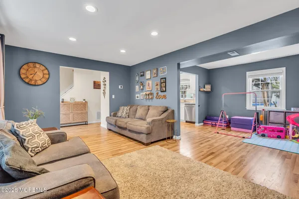 a room with furniture and a flat screen tv