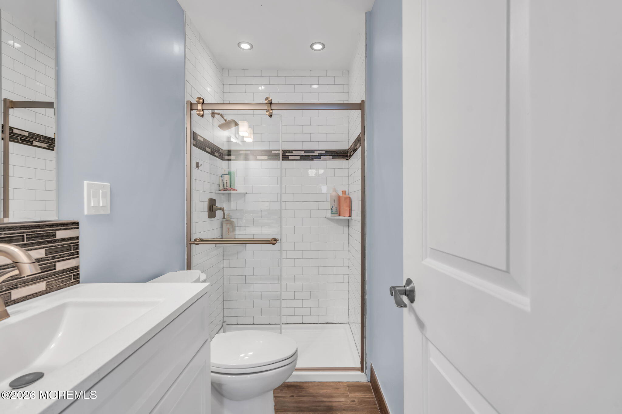 24 Eric Drive Howell, NJ 07731 - Photo 37 of 58 a bathroom with a bathtub a toilet and a shower