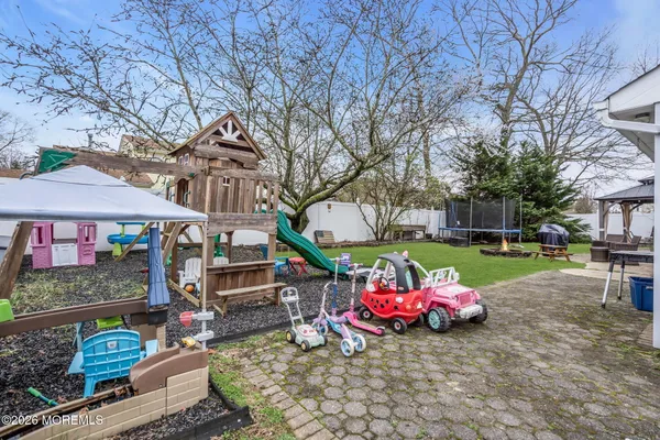 a table and chairs in the garden