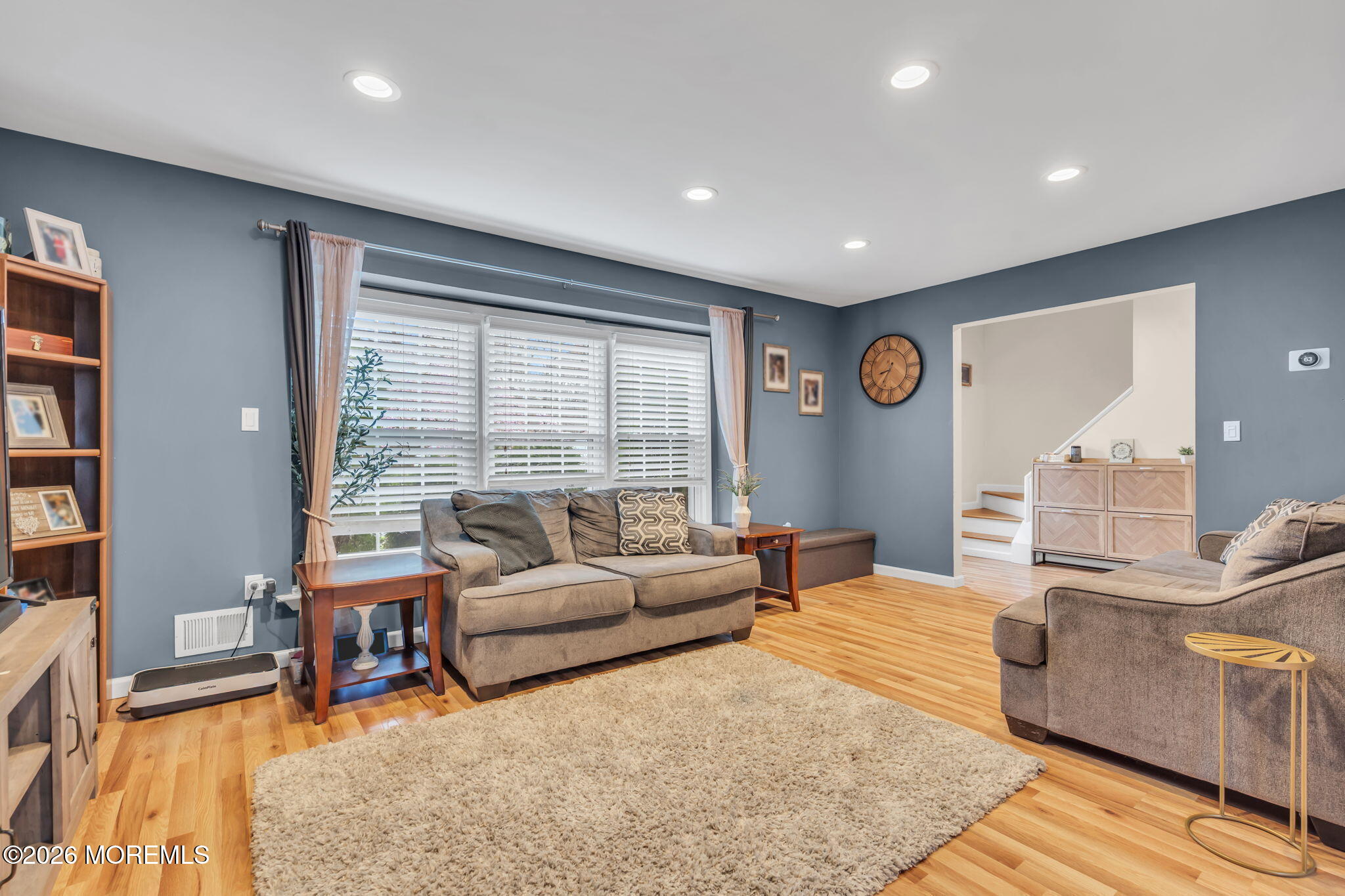 24 Eric Drive Howell, NJ 07731 - Photo 5 of 58 a living room with furniture and a large window