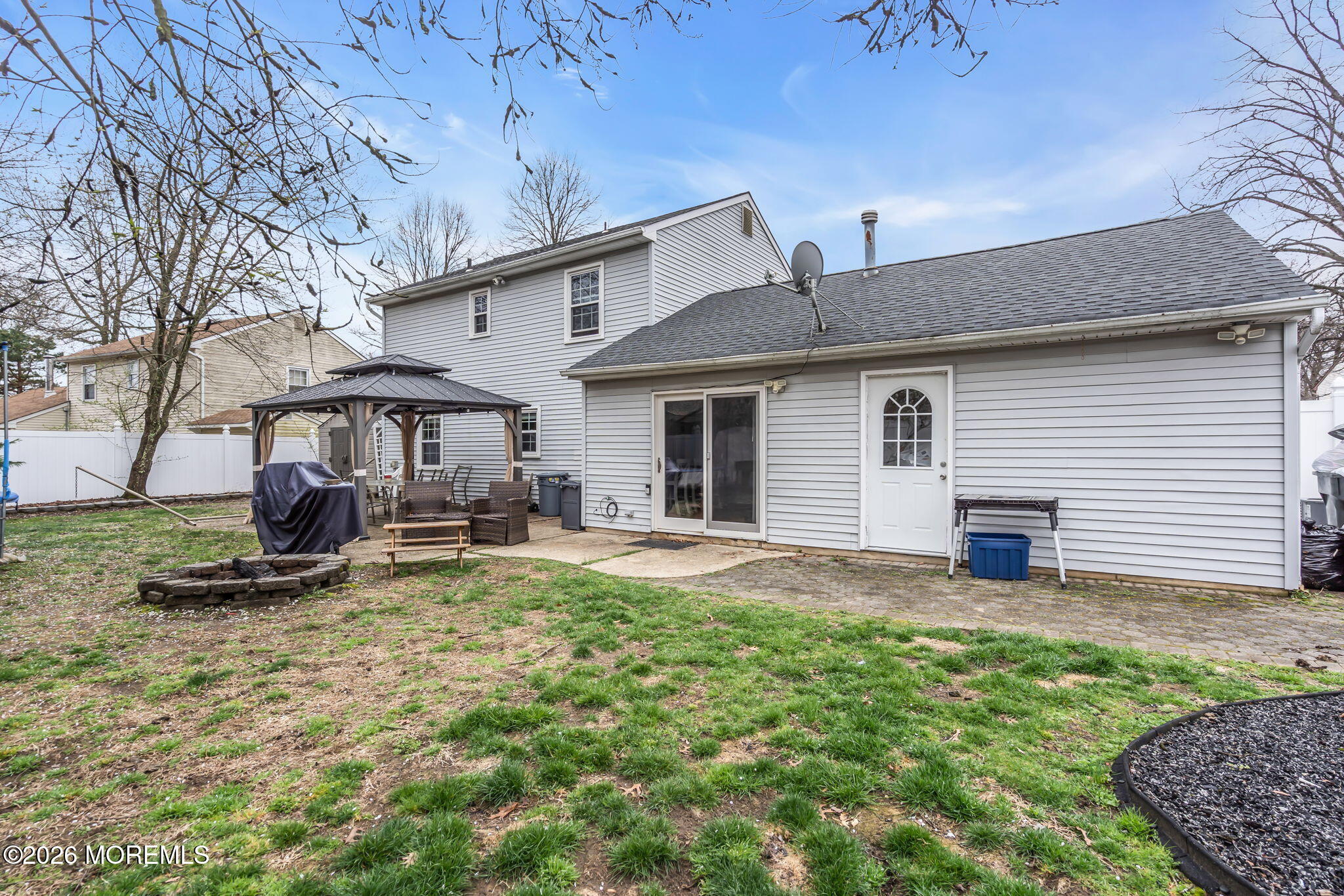 24 Eric Drive Howell, NJ 07731 - Photo 53 of 58 a view of a house with backyard and sitting area