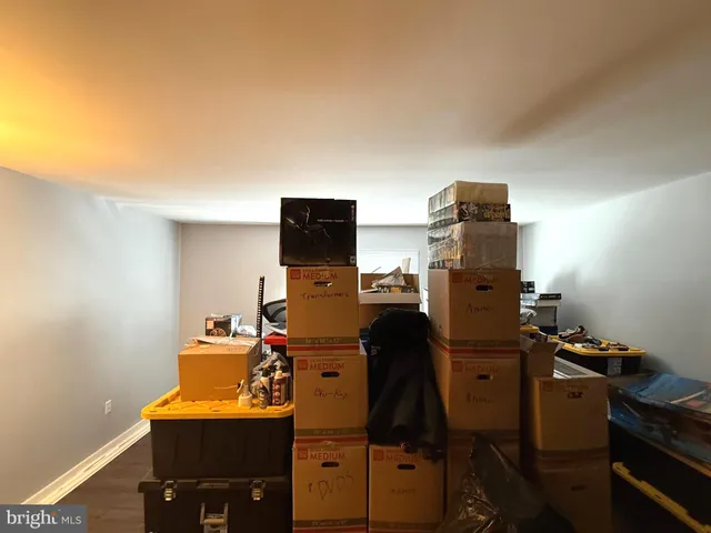 a utility room with sink dryer and washer