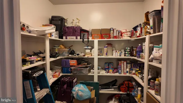 a room with storage and utility
