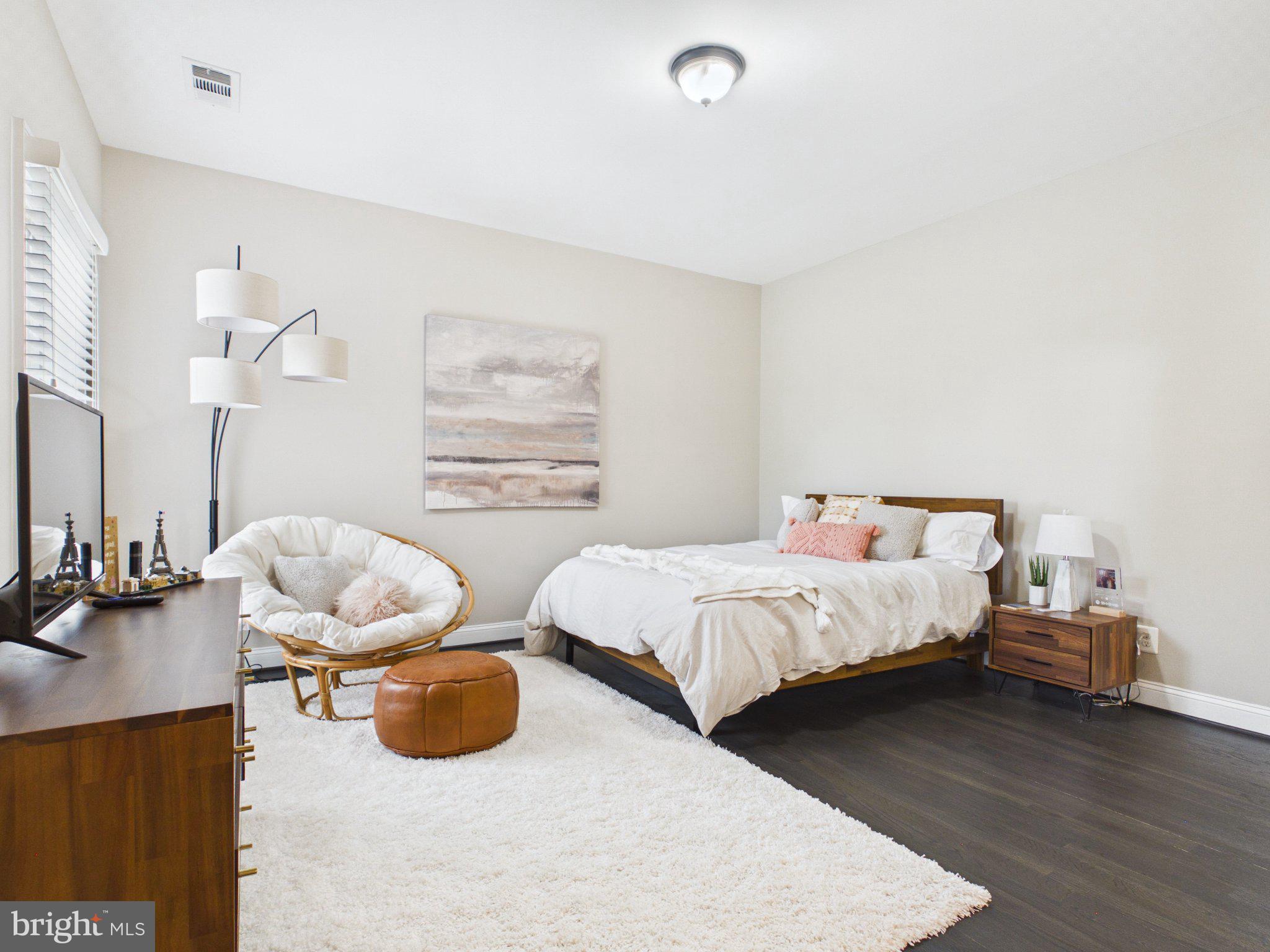 38565 Piggott Bottom Road Hamilton, VA 20158 - Photo 30 of 85 Serene bedroom with modern elegance.