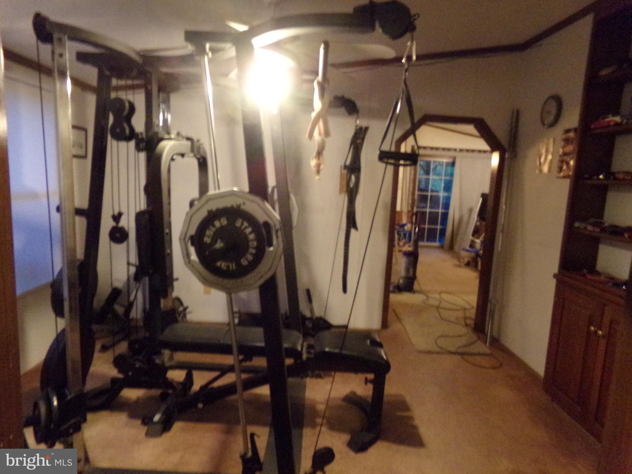 918 Gun Club Road Stephenson, VA 22656 - Photo 16 of 37 DINING ROOM PRESENTLY USED AS WEIGHT ROOM