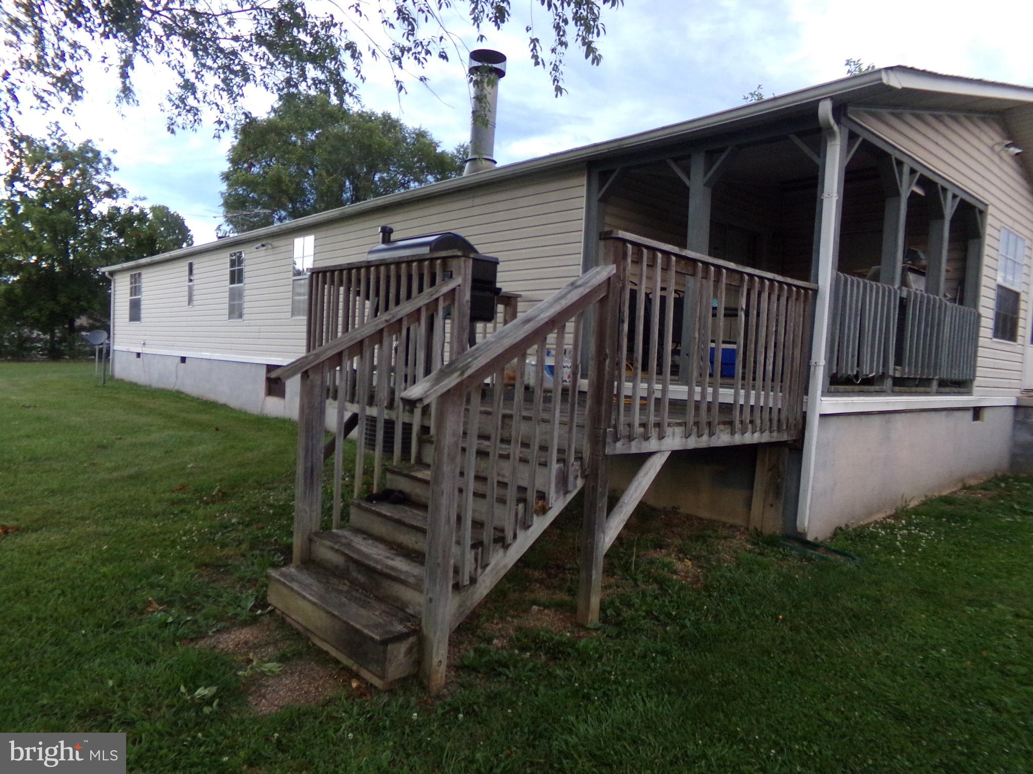 918 Gun Club Road Stephenson, VA 22656 - Photo 4 of 37 REAR OF HOUSE WITH DECK