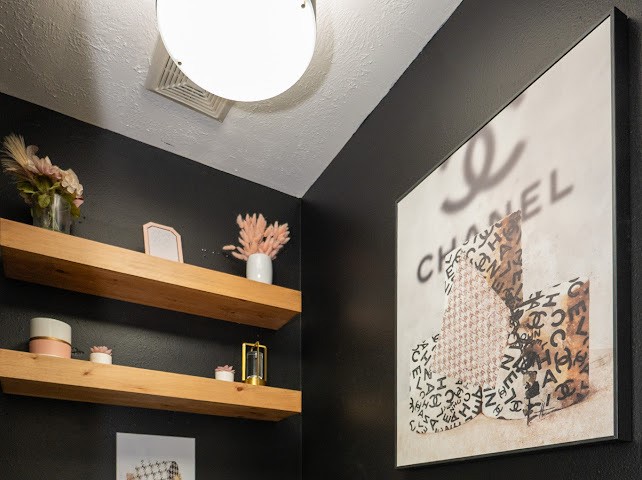 1114 Wagon Road Simonton, TX 77485 - Photo 39 of 48 Stylish primary toiletry room with sleek black walls, and elegant wooden shelves creating a sophisticated ambiance.
