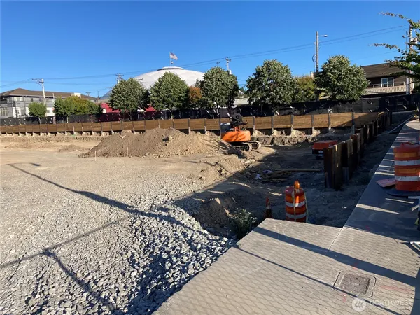 an aerial view of a house livingroom and hallway with couches