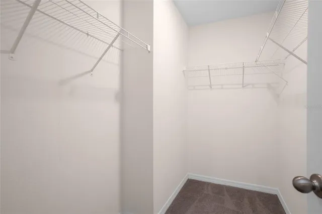 an empty room with a hallway
