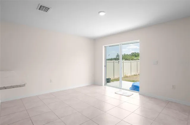 a view of an empty room with window