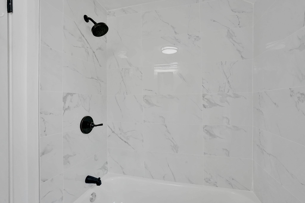 100 Abbott Street Springfield, MA 01118 - Photo 20 of 31 a bathroom with a shower