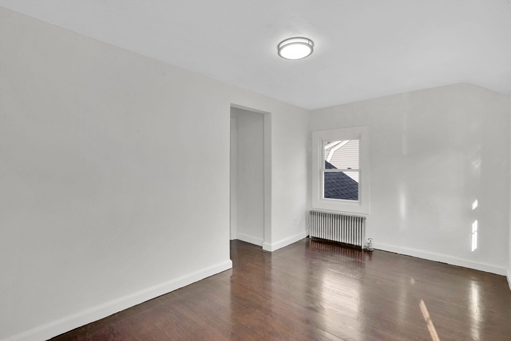 100 Abbott Street Springfield, MA 01118 - Photo 22 of 31 a view of empty room with wooden floor