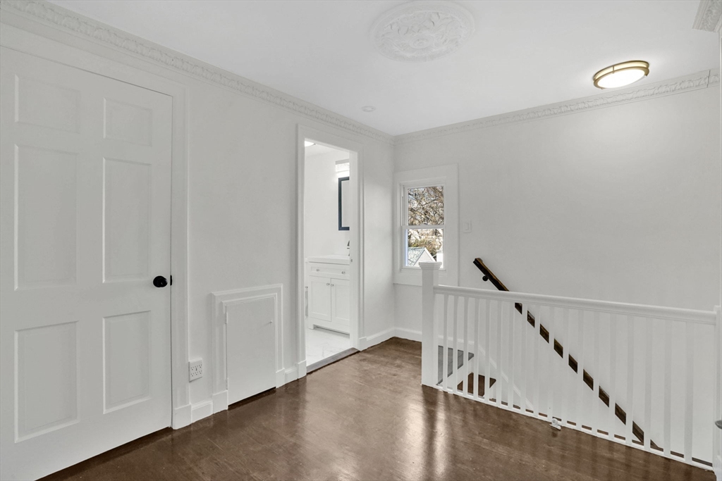 100 Abbott Street Springfield, MA 01118 - Photo 27 of 31 a view of a hallway with wooden floor