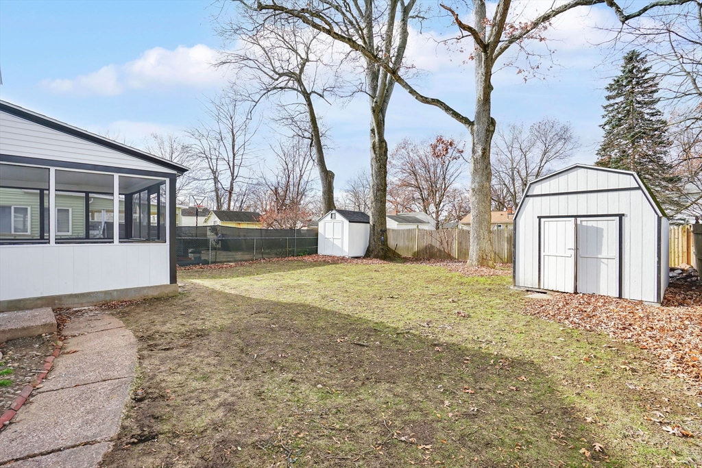 100 Abbott Street Springfield, MA 01118 - Photo 5 of 31 a view of a house with snow on the road