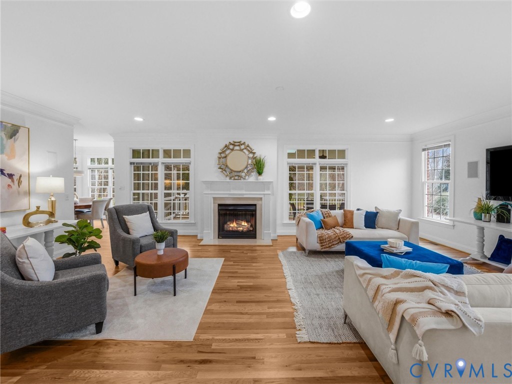 14335 Lander Road Midlothian, VA 23113 - Photo 28 of 70 a living room with furniture and a fireplace