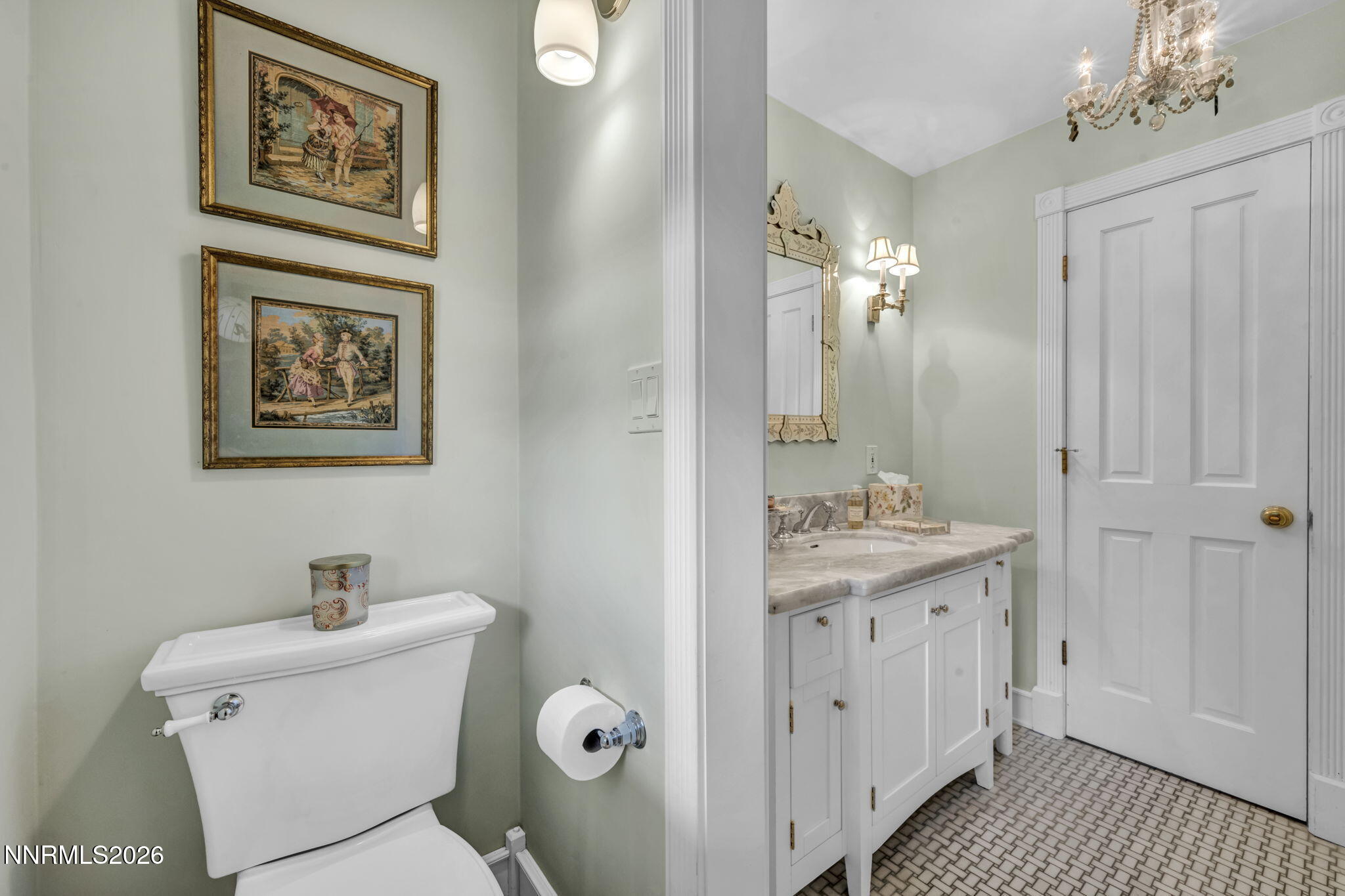 4010 Canyon Drive Reno, NV 89519 - Photo 143 of 147 a bathroom with a toilet a sink and mirror