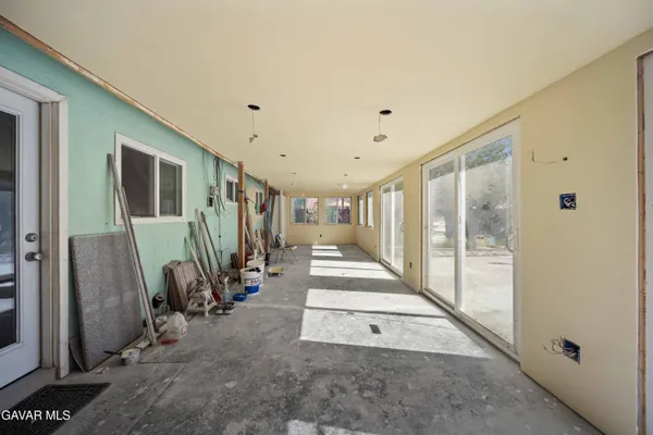 a view of a hallway with staircase