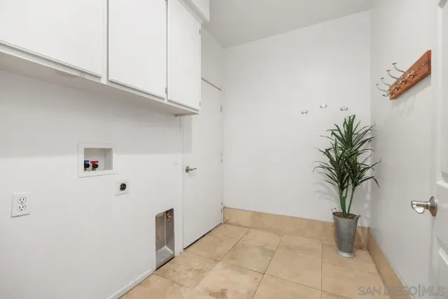 a view of small space with cabinets