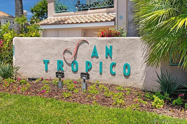 a view of a swimming pool with a table and chairs