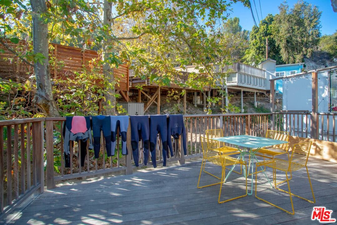 68 Paradise Cove Road Malibu, CA 90265 - Photo 13 of 28 a view of a chairs and table in patio