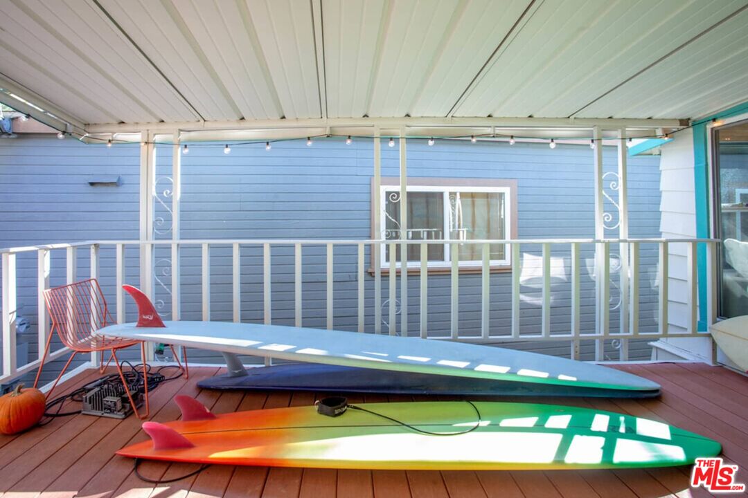 68 Paradise Cove Road Malibu, CA 90265 - Photo 14 of 28 a view of a chairs and table in the patio